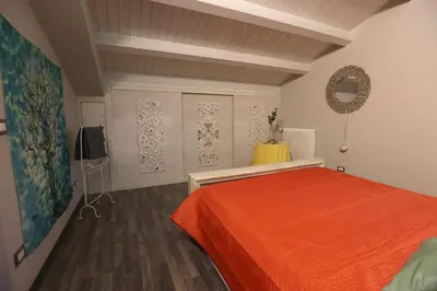 Letto o letti in una camera di Casa delle foglie