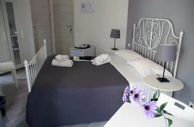 Letto o letti in una camera di Del Toscano Home