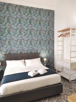 Letto o letti in una camera di B&B Casa Carola