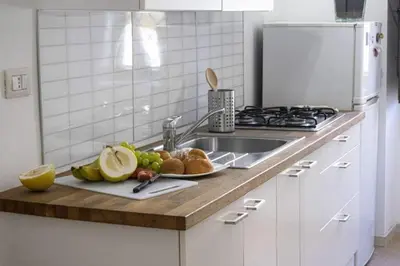 Cucina o angolo cottura di La Casa del Moro Catania Centro - Villa Bellini