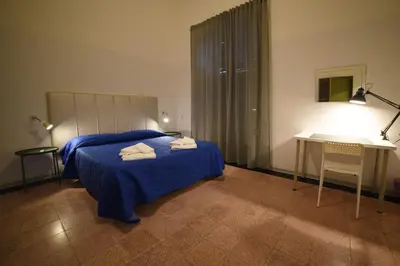 Letto o letti in una camera di TIFEO Bed & Breakfast