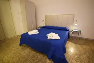 Letto o letti in una camera di TIFEO Bed & Breakfast