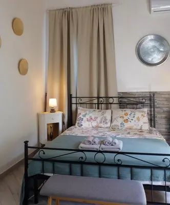Letto o letti in una camera di B&B CasaNera