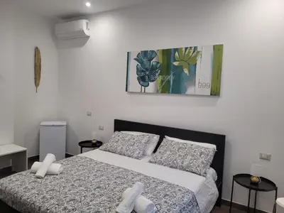 Letto o letti in una camera di Casa del Forestiero