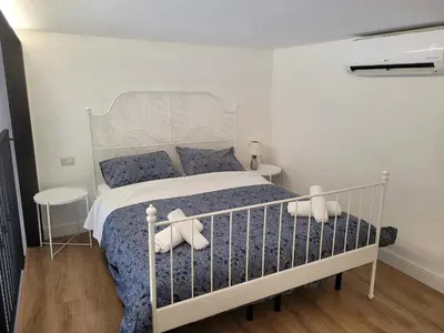 Letto o letti in una camera di Casa del Forestiero