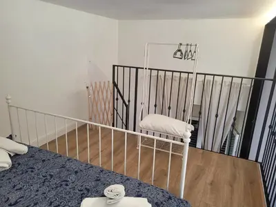 Letto o letti in una camera di Casa del Forestiero