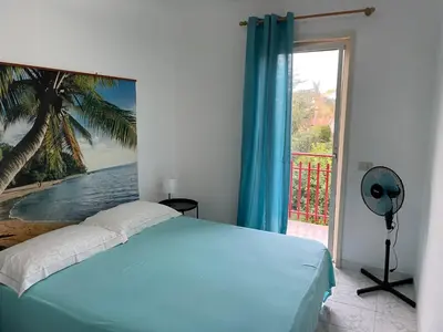 Letto o letti in una camera di Sunshine Villa