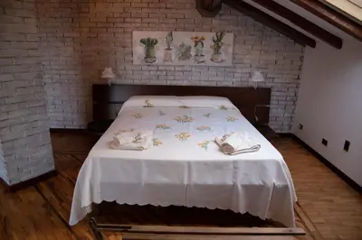 Letto o letti in una camera di Boutique Villa Etna d'A'mare