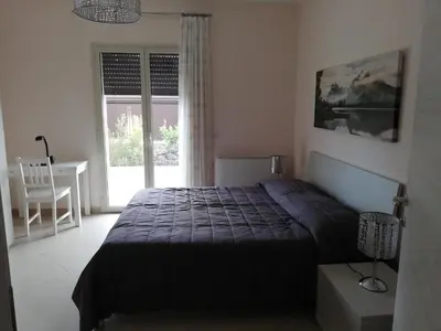 Letto o letti in una camera di L'elicriso B&B