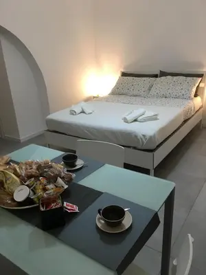 Letto o letti in una camera di FREE FLAT