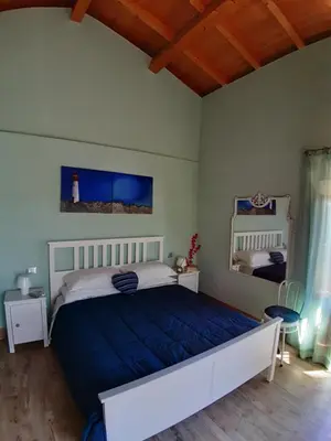 Letto o letti in una camera di L.T. METIS