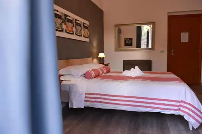 Letto o letti in una camera di Residenza Del Turista