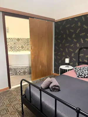 Letto o letti in una camera di CASA STESICORO