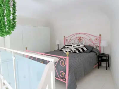 Letto o letti in una camera di a casa del reuccio