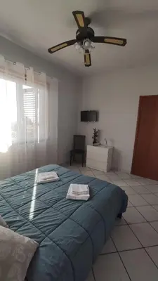 Letto o letti in una camera di I capricci dell' Etna suite
