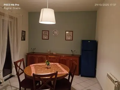Area soggiorno di I capricci dell' Etna suite