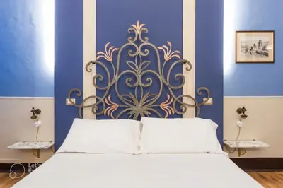 Letto o letti in una camera di Let's B&B