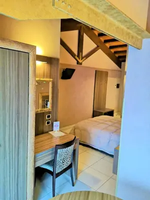 Letto o letti in una camera di B&B Acireale - Il Cavalluccio Marino Fronte Mare