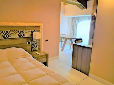 Letto o letti in una camera di B&B Acireale - Il Cavalluccio Marino Fronte Mare