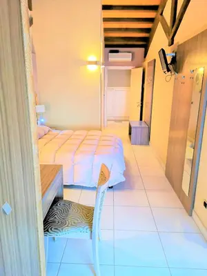 Letto o letti in una camera di B&B Acireale - Il Cavalluccio Marino Fronte Mare