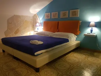 Letto o letti in una camera di Borgo Marinaro