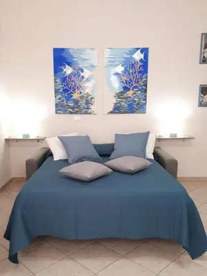 Letto o letti in una camera di Casa Mia Miniapartment