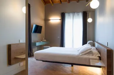 Letto o letti in una camera di Nèroli Bio Relais