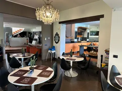 Area soggiorno di Ottomood B&B and Apartments