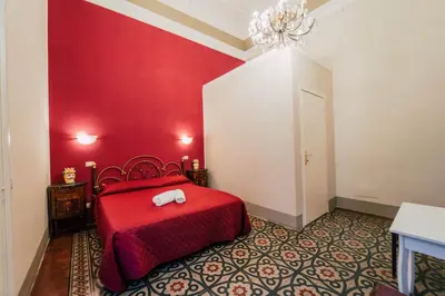 Letto o letti in una camera di Stanze etnea 380