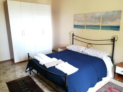 Letto o letti in una camera di Casa Levante Sea View Apartment