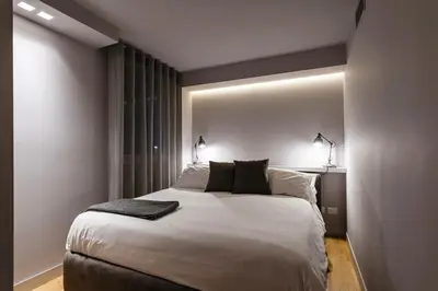 Letto o letti in una camera di Ferrini Home - Rindone 6