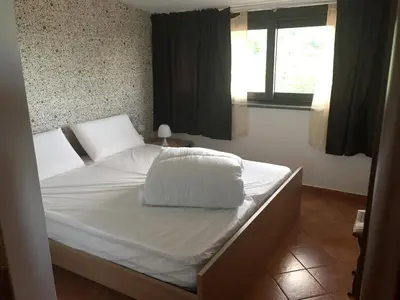 Letto o letti in una camera di Spacious Apartment in Zafferana Etnea 65 m² with Private Garden