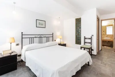 Letto o letti in una camera di GuestHost - Penelope Seaview Apartment