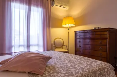 Letto o letti in una camera di Lillà - Home and Garden