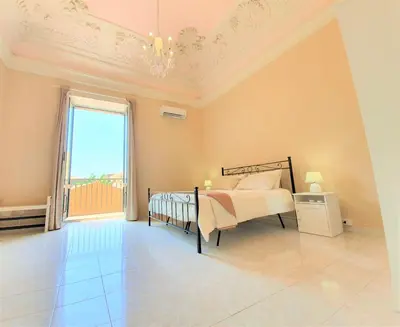 Letto o letti in una camera di Antica Dimora Barocca