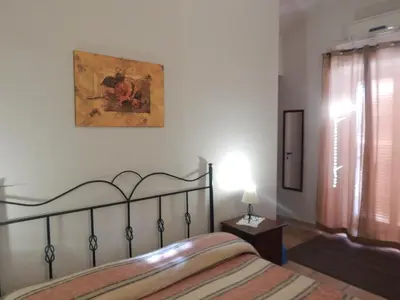Letto o letti in una camera di Albatro Rooms