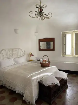 Letto o letti in una camera di Fera O' Luni