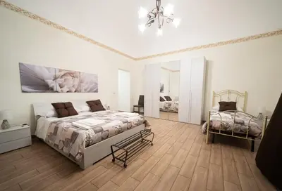 Letto o letti in una camera di Le Vie del Centro B&B