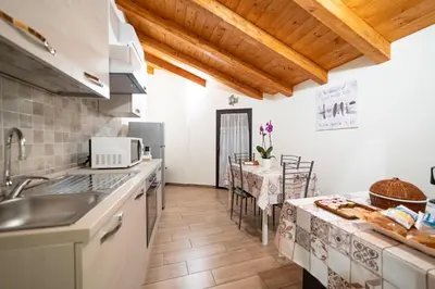 Cucina o angolo cottura di Le Vie del Centro B&B