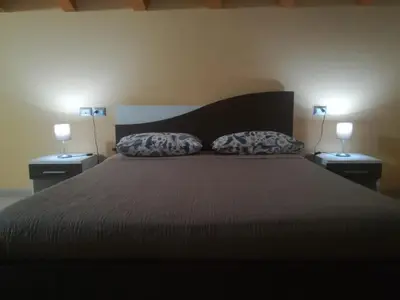 Letto o letti in una camera di I Colori dell'Etna