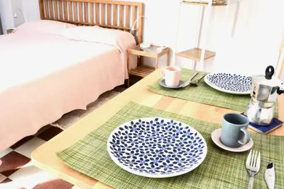 Letto o letti in una camera di Il giardino delle zagare - miniappartamento tra Etna e mare