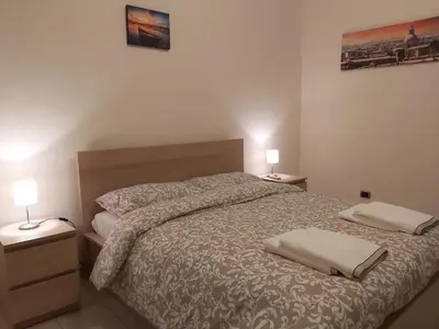 Letto o letti in una camera di COCO Apartments