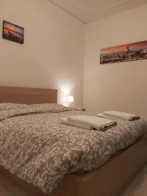 Letto o letti in una camera di COCO Apartments