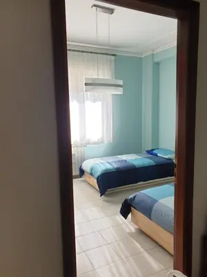 Letto o letti in una camera di COCO Apartments