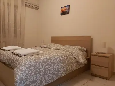Letto o letti in una camera di COCO Apartments