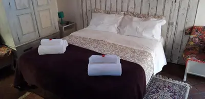 Letto o letti in una camera di La Mansarda-roof