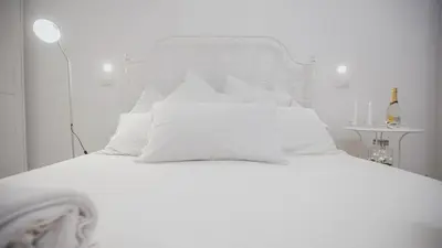 Letto o letti in una camera di Cortile Oliva