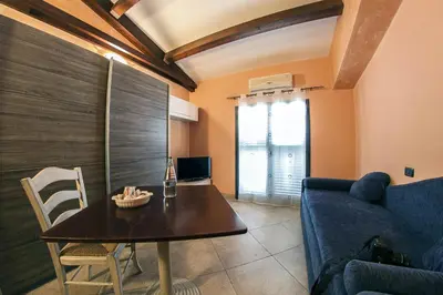 Area soggiorno di Charming apartment in Capo Mulini with sea view - 50 m²