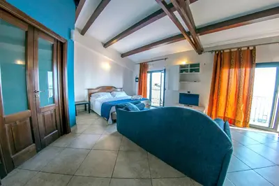 Letto o letti in una camera di Charming apartment in Capo Mulini with sea view - 50 m²
