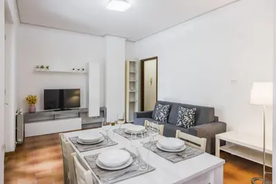 Area soggiorno di Ortensia Apartments by Wonderful Italy